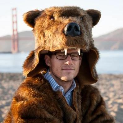 Faux fur grizzly bear coat at the beach