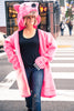 Griz Coat's Pink Agenda Bear Coat crossing street