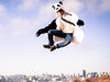 Guy in Panda Coat jumping over SF